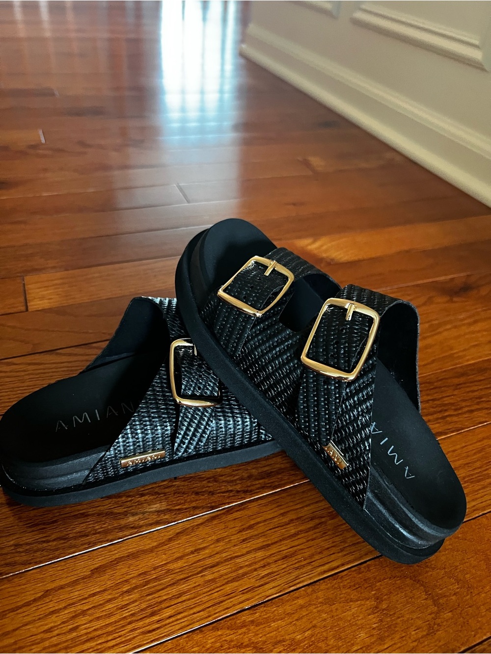 AMIAN Black Woven Double-Buckle Slide Sandals with Gold Buckles